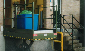 Bin lift for loading from ground level